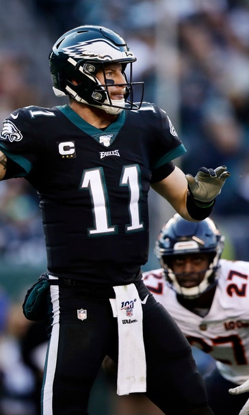 Despite injuries, inconsistency, Eagles in the race at bye